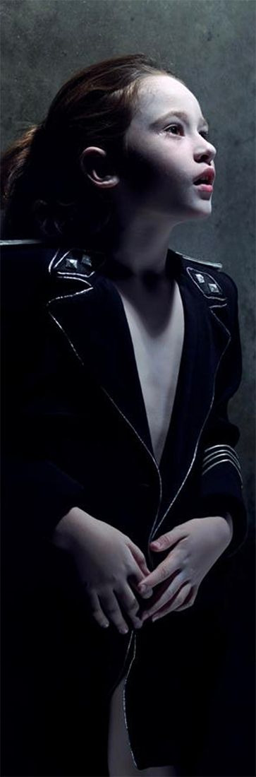 Ozzy Osbourne with Family - and Helnwein Art Work