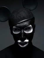 Manson's collaboration with world renown artist Gottfried Helnwein can be viewed in the same way: a combination of low art (rock music) with high art (painting) Manson's collaboration with world renown artist Gottfried Helnwein can be viewed in the same way: a combination of low art (rock music) with high art (painting)