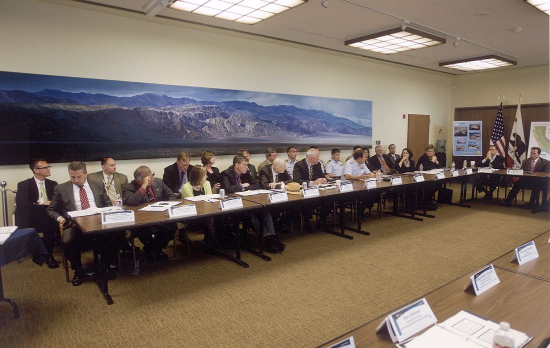 Homeland security Meeting in front of Helnwein's 'Death Valley' painting at the State Capitol, Sacramento, California